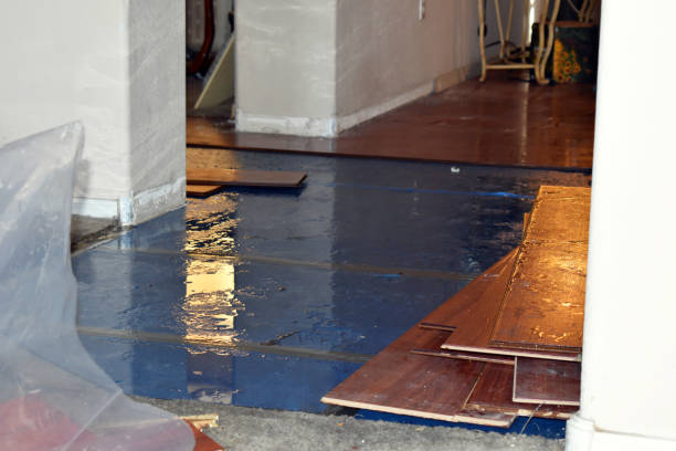 Professional Flood Damage Restoration technician working in Fultonham, OH
